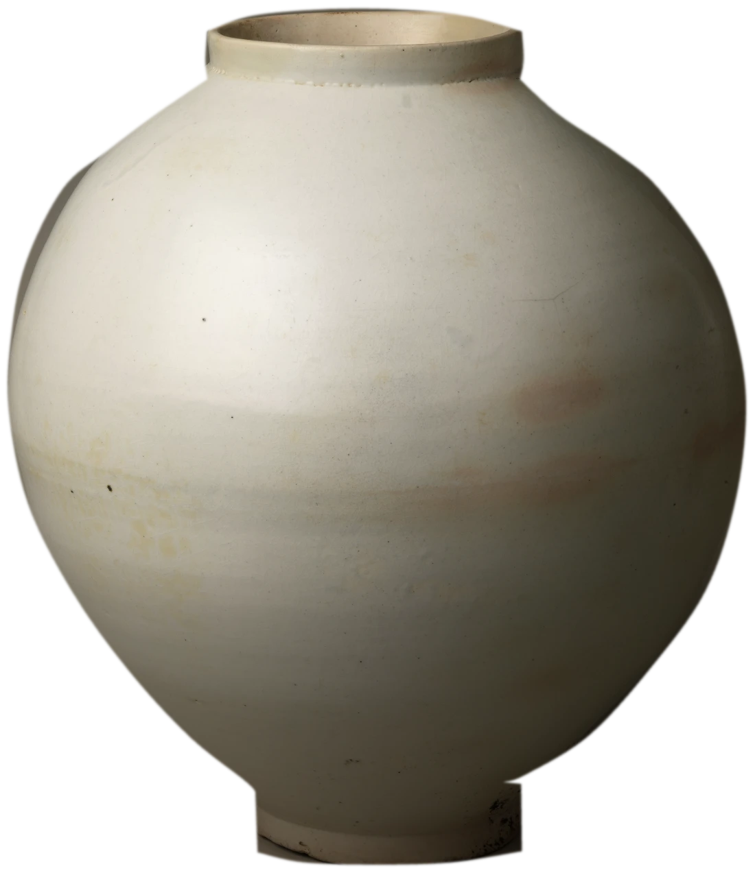 A white porcelain moon jar, round and slightly uneven, rising in front of the word Imperfect